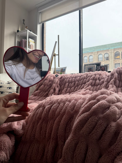 girl wearing white affirmation t-shirt you got this red heart mirror selfie cozy pink blanket bedroom